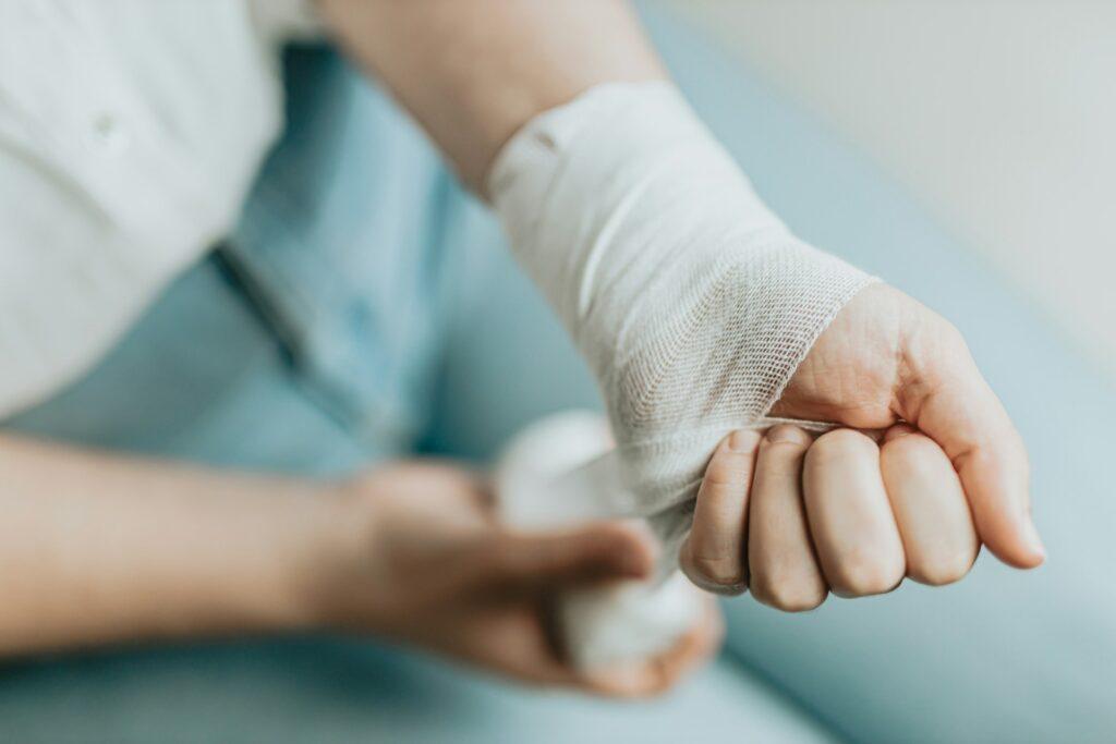 a person's arm wrapped with gauze