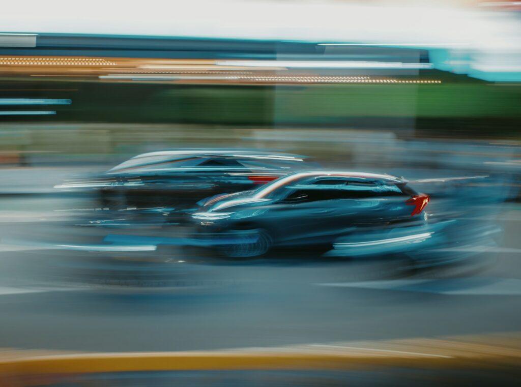 a blurry photo of a car in motion