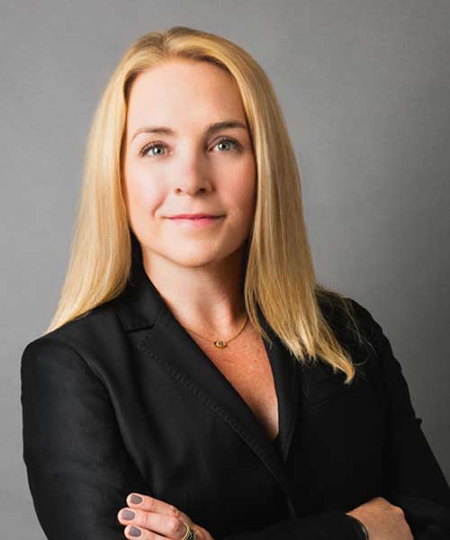 Illinois Personal Injury Lawyer Carolyn Daly in a suit for a profile picture