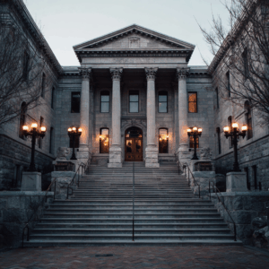 the front of a courthouse during the day