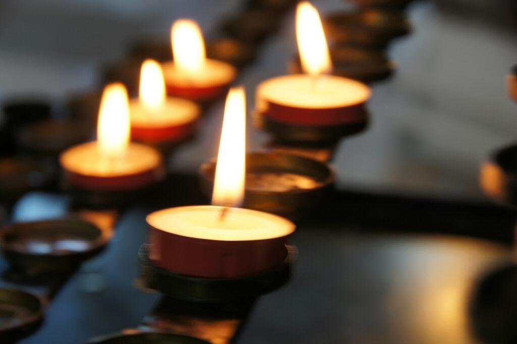 an arrangement of small lit candles