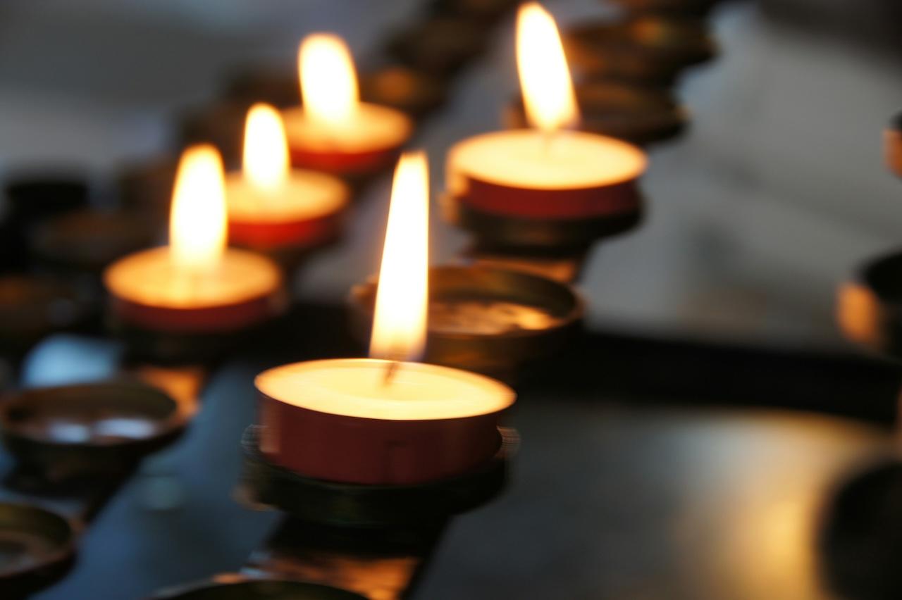 an arrangement of small lit candles