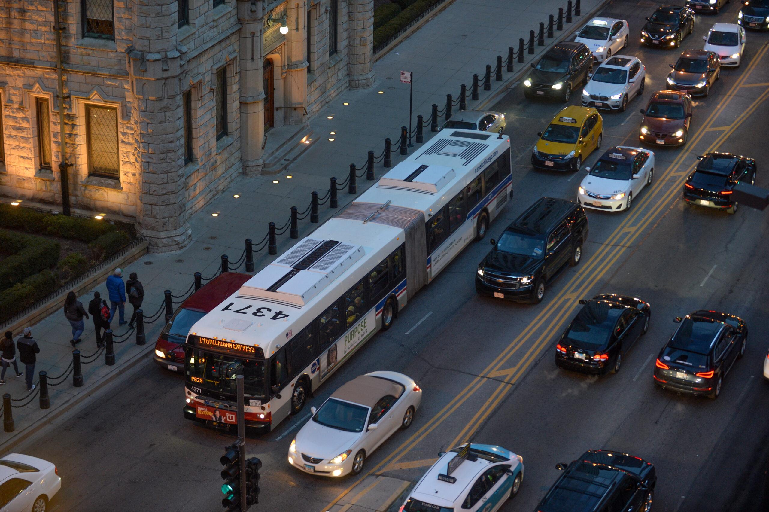 A city bus in traffic